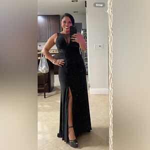 Beautiful Gown very form fitting.